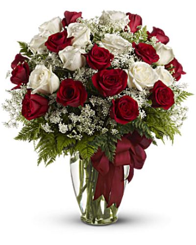 <div id="mark-3" class="m-pdp-tabs-marketing-description">It's like receiving an armful of love. This big, beautifully billowing bouquet of lush red and white roses in a sparkling Ming vase is guaranteed to take her breath away. She'll be dazzled, touched - and so glad that you're her guy.</div>
<div id="desc-3">
<ul>
<li>Red and white roses - accented with Queen Anne's lace and more - are delivered in a glass vase accented with a red satin ribbon.</li>
</ul>
</div>